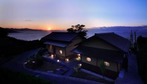 an overhead view of two buildings at sunset at 間人温泉 炭平 in Kyotango