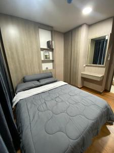 Postel nebo postele na pokoji v ubytování The city hatyai condo B410