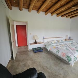 Ένα ή περισσότερα κρεβάτια σε δωμάτιο στο Alquiler Casa de Campo Asia Cañete