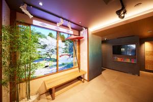 Postel nebo postele na pokoji v ubytování MONday Apart Premium Asakusa