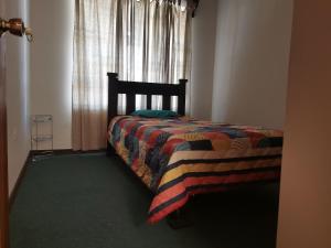 Postel nebo postele na pokoji v ubytování Casa Brumas