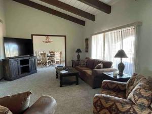 Χώρος καθιστικού στο The Team Ropers Ranch House