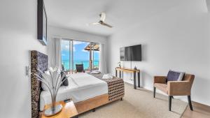 Letto o letti in una camera di Whitsunday Reflections