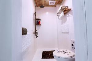 Koupelna v ubytování Zhoujia Hostel + 37 fotografií