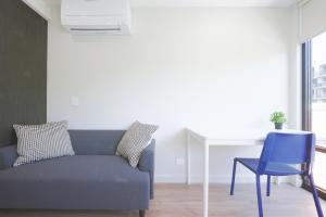 Area soggiorno di Modern apt in heart of the city