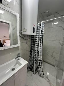 Koupelna v ubytování M-23 Hotel + 37 fotografií