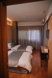 Postel nebo postele na pokoji v ubytování Hotel Ehden