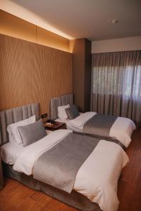 Postel nebo postele na pokoji v ubytování Hotel Ehden