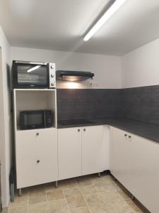 Köök või kööginurk majutusasutuses L'Oratori : chambre l'Authentique
