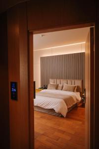 Postel nebo postele na pokoji v ubytování Hotel Ehden