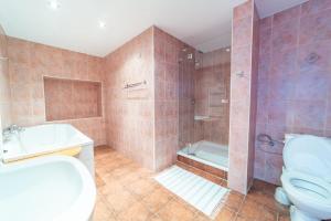 Koupelna v ubytování Hotel Palazzo + 37 fotografií