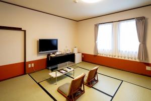 TV a/nebo společenská místnost v ubytování 那須高原Stay 菊