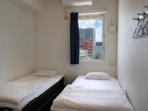 那覇市にある個室ホステル 美らキャビン 国際通り店のギャラリーの写真