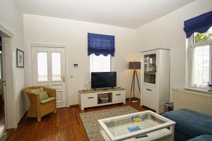Μια τηλεόραση ή/και κέντρο ψυχαγωγίας στο Haus Dittersbach +14 φωτογραφίες