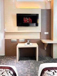 TV o dispositivi per l'intrattenimento presso Batam City Hotel