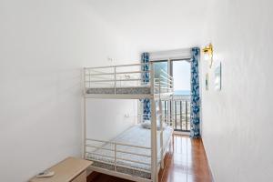 Posteľ alebo postele v izbe v ubytovaní Beach apartment in Malaga