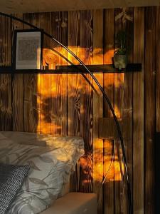 Uma cama ou camas num quarto em Chatička u Olšovce, Jedovnice