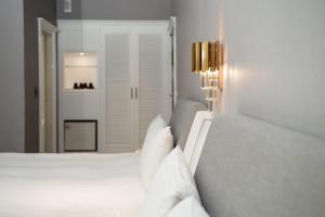 Postel nebo postele na pokoji v ubytování Fu Hsiang Hotel