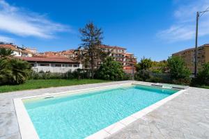 The swimming pool at or close to Il Gattino di Porto - apt 4 - Monolocale terrazzo piscina