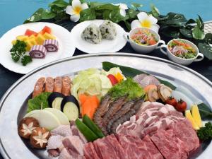 a plate of food with different types of food at Resort Hotel Kume Island in Kumejima