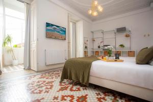 En eller flere senge i et værelse på SingularStays Ms Rogers