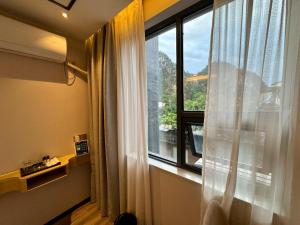 Fotografie z fotogalerie ubytování Guilin Tree Hotel v destinaci Kuej-lin