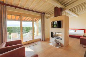 A television and/or entertainment centre at Mastrojanni Relais