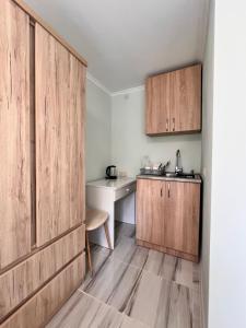 Kuchyň nebo kuchyňský kout v ubytování Cozy Haven