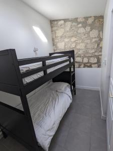 Postel nebo postele na pokoji v ubytování Domaine Le Translon