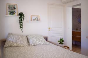 Letto o letti in una camera di Maisonnette vue mer au Pradet