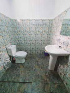 Koupelna v ubytování Sanu Home stay