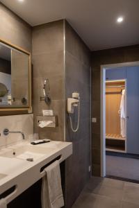 Vannituba majutusasutuses Hotel Les 3 Cles