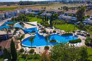 an aerial view of a resort with a pool at Atlantis Gardens in Mazotos