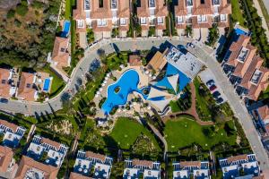 an aerial view of a suburb with houses at Atlantis Gardens in Mazotos