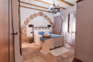Postel nebo postele na pokoji v ubytování Casa rural el rincón del Altozano