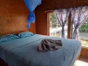 Imagination Island Eco Resort客房内的一张或多张床位