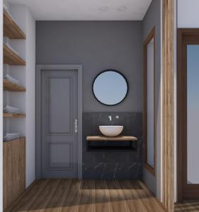 a bathroom with a sink and a mirror at Athos Villas in Ouranoupoli