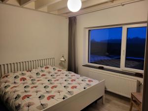 Postel nebo postele na pokoji v ubytování Villa Intensity