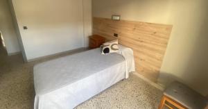 A bed or beds in a room at Apartament Centre Platja