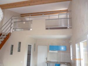 a room with a staircase in a house at Villa THELISE in Le Muy