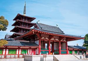 a large building with a tower on top of it at RELAX Condo Namba Daikokucho in Osaka
