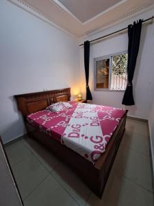 Postel nebo postele na pokoji v ubytování cosy chez Gaby