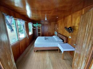 Imagination Island Eco Resort客房内的一张或多张床位
