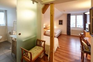 Postel nebo postele na pokoji v ubytování Landgasthof Hotel Rössli