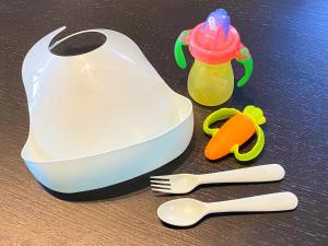 a white plastic container with a baby bottle and a fork and spoon at Urban Resort Villa ILILANI in Inbu +55 photos