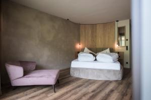 Giường trong phòng chung tại Hotel Patris