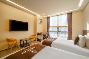 TV a/nebo společenská místnost v ubytování Gloucester Hotel Incheon