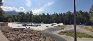 a skate park with a skateboard ramp in a park at Piolit andCo - Studio vue montagne in Ancelle +3 photos