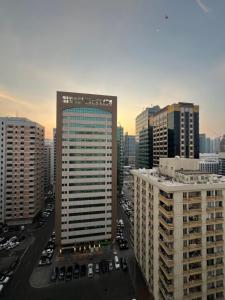 an aerial view of a city with tall buildings at Managa-naga Room1204 near abu dhabi mall in Abu Dhabi