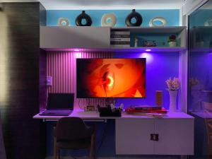 TV a/nebo společenská místnost v ubytování La Casa Felice + 3 fotografie